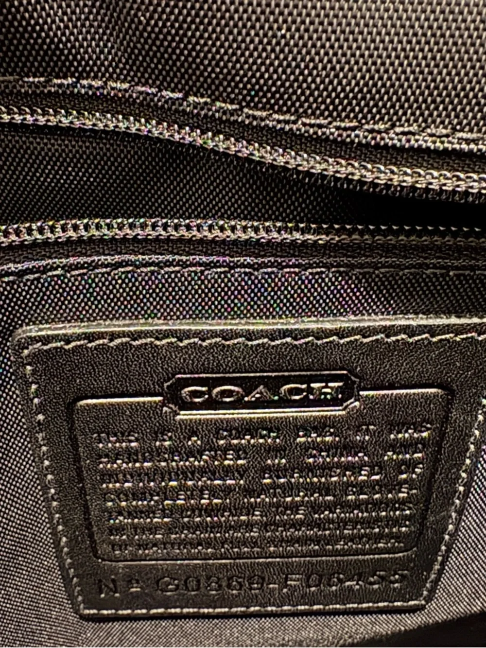 Coach sleek black